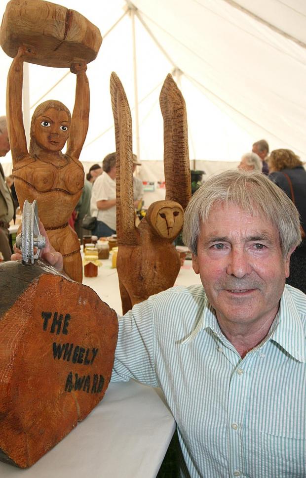 County Times: Berriew Show pic is Ray Jones from Llandyssil who had various 1st prizes in the show and the cup for most entries in the show (55)PB513L-2006